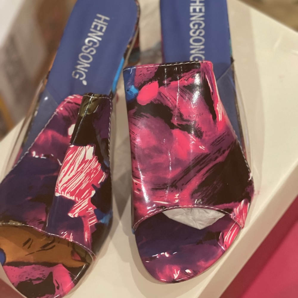 Floral shoe with rhinestones covering block heel. Size 9
